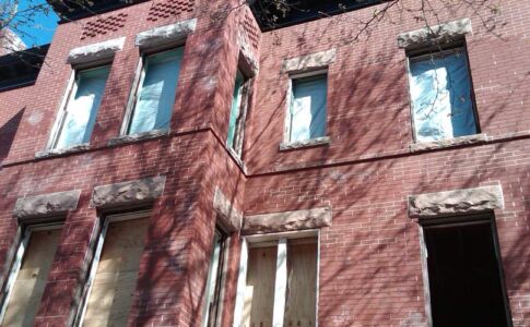 The brick facade was largely repointed, a process which repairs or replaces mortar joints damaged by weathering over time. Working with guidance from the DC Historic Preservation Office, the joints were painstakingly stained as per the original. Exterior brickwork repairs in progress
