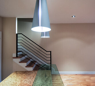 Warm natural materials -- wood floors, granite countertops -- are found throughout the interiors. Granite countertop and wood floors