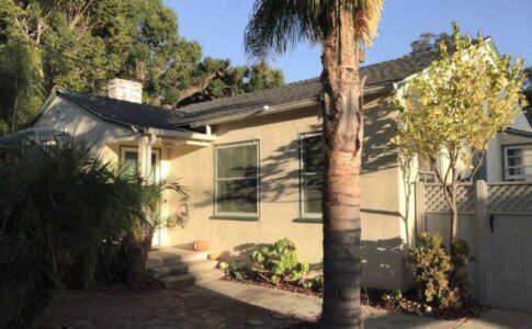 The existing front entry porch was quite small, just room enough for one person to stand out of the rain. Photo of existing house in SLO
