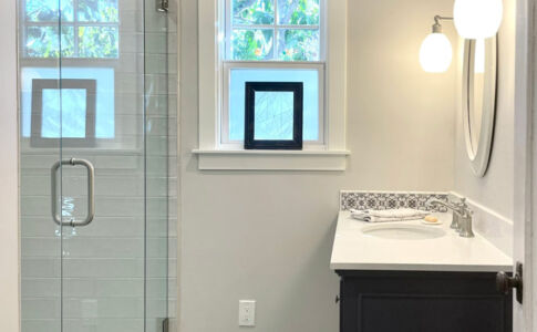 A serene newly-renovated guest bath replaces a very outdated one, which had been the only bathroom in the house prior to remodeling. Photo of remodeled bathroom